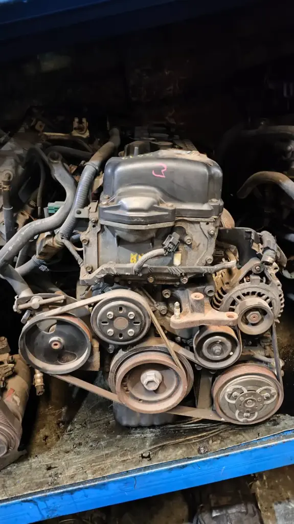 MOTOR QG18 AT 4X2 TAPA NEGRA OBT. MECANICO